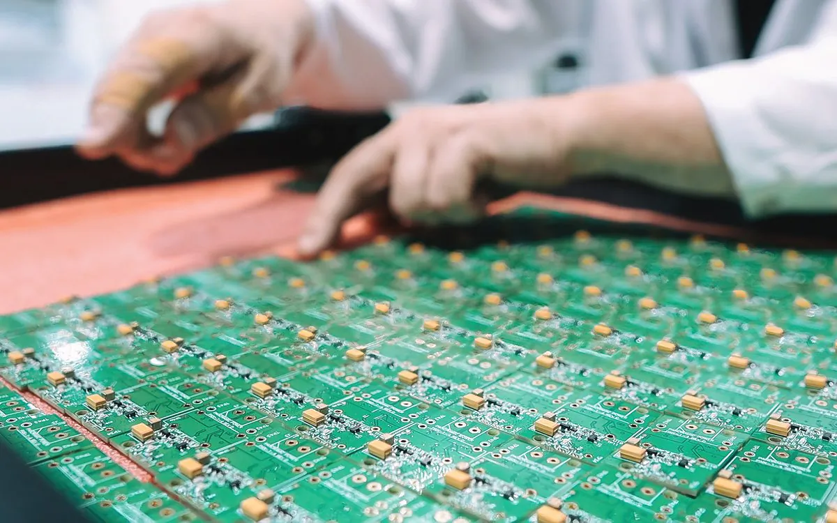 Rows of assembled PCBs from a high-volume production run